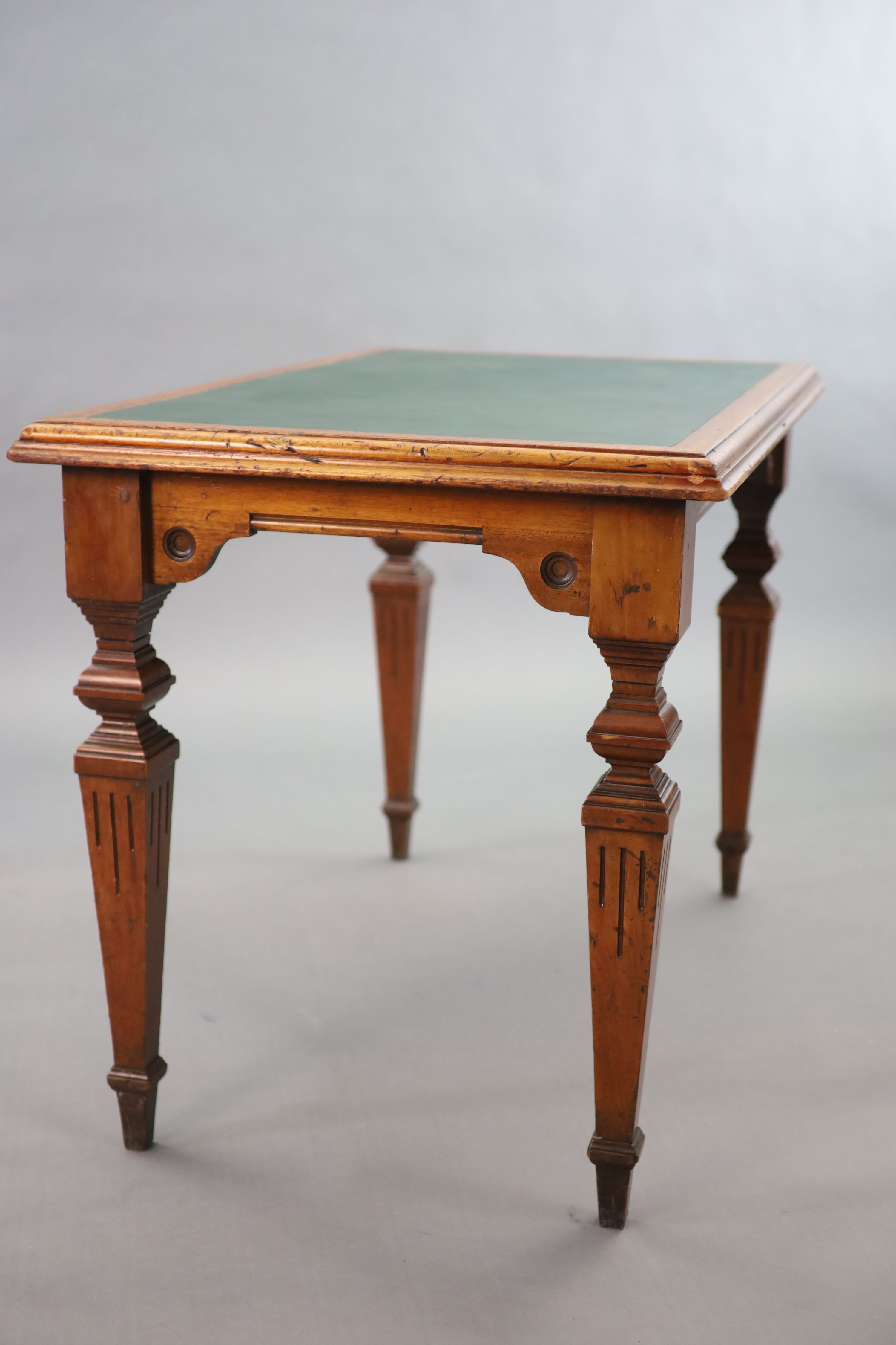 A Victorian mahogany library table, supplied by Sage & Co. Shopfitters of London, W.113cm D.69cm H.78cm